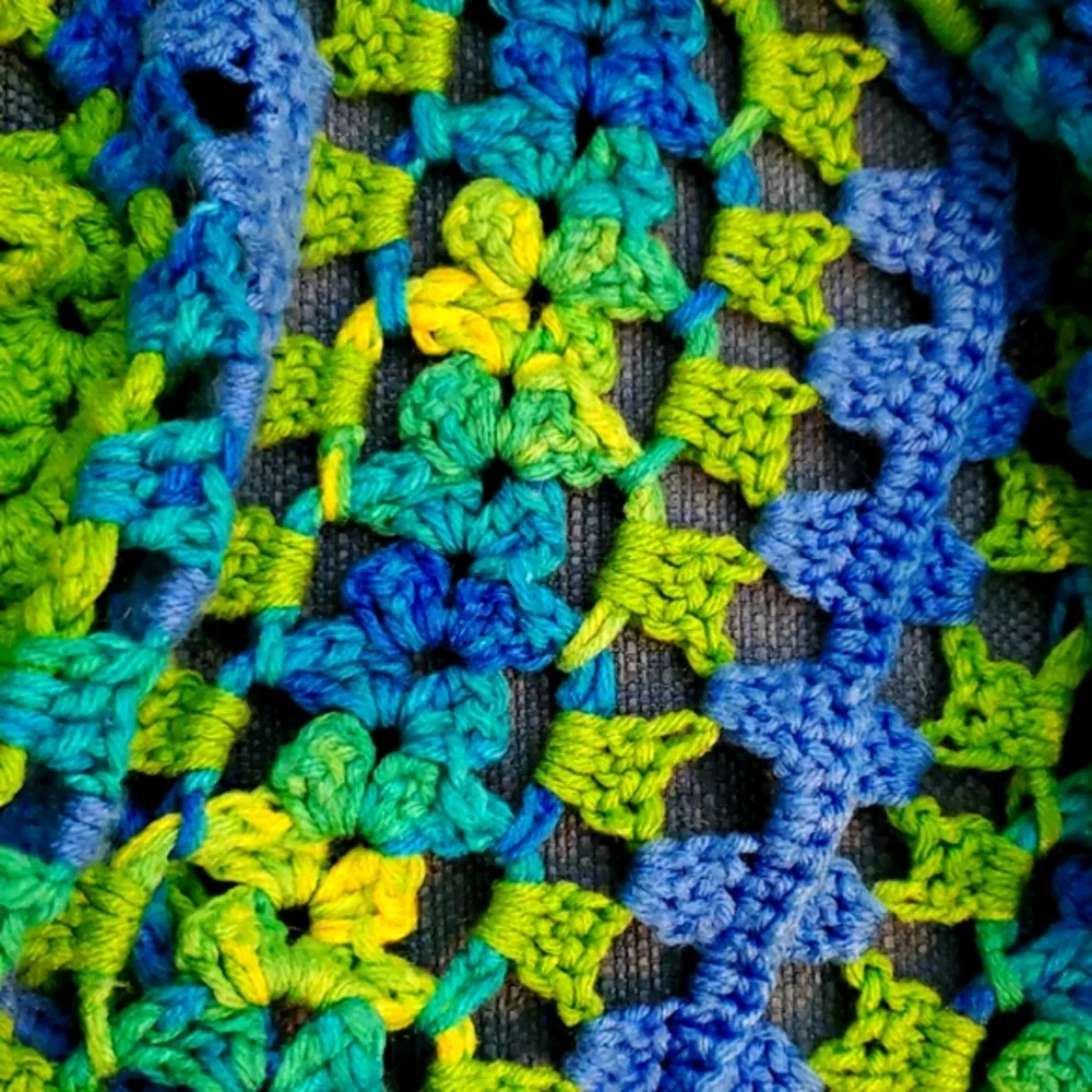 Mile a minute afghan in lime green, bright blue